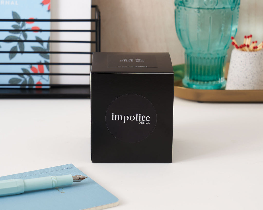 Sea salt and driftwood handmade soy wax scented candle black box packaging positive affirmation gift