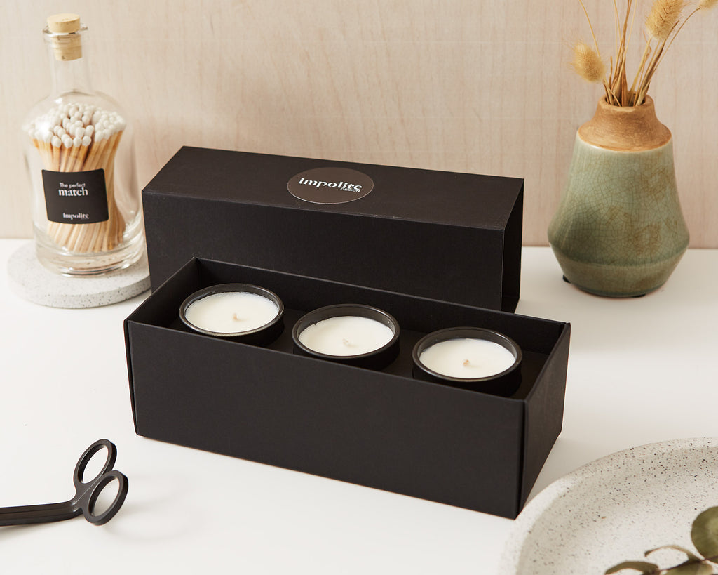 Set of three mini travel soy wax votive scented candles in black gift box